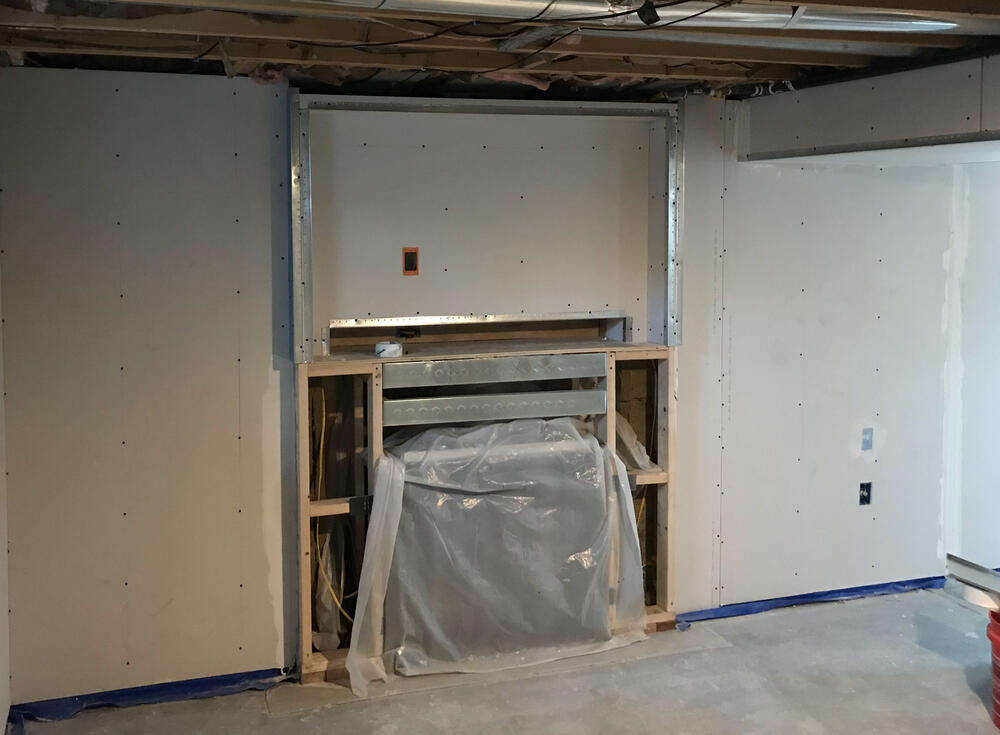 Drywall and custom shelf for tv and equipment
